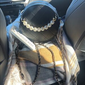 Madison West Black Round Quilted Bag